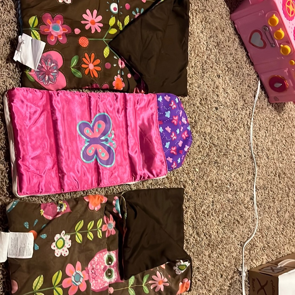 Three American girl, doll sleeping bags